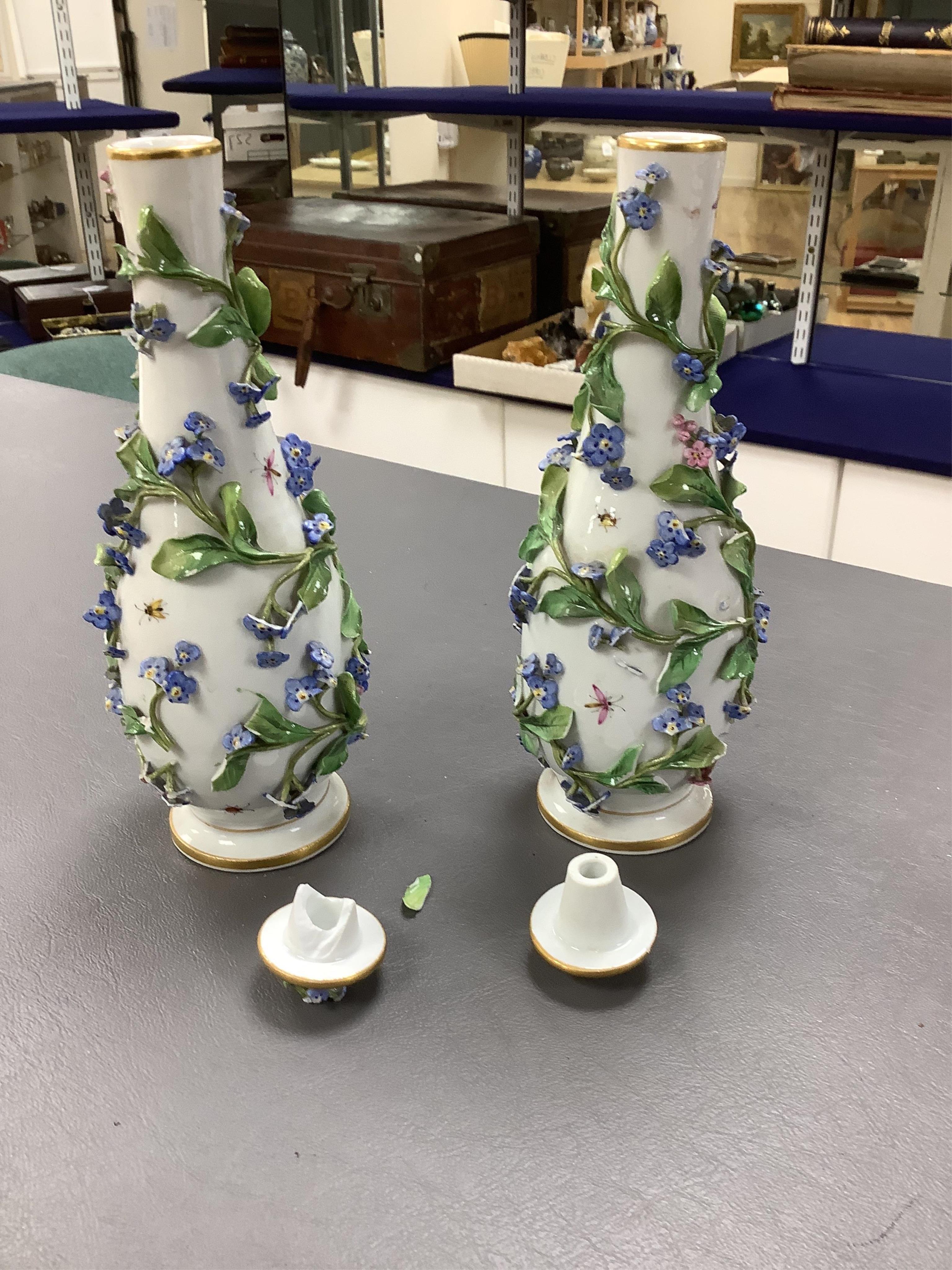 A pair of late 19th century Meissen flower encrusted vases and covers, 20cm high